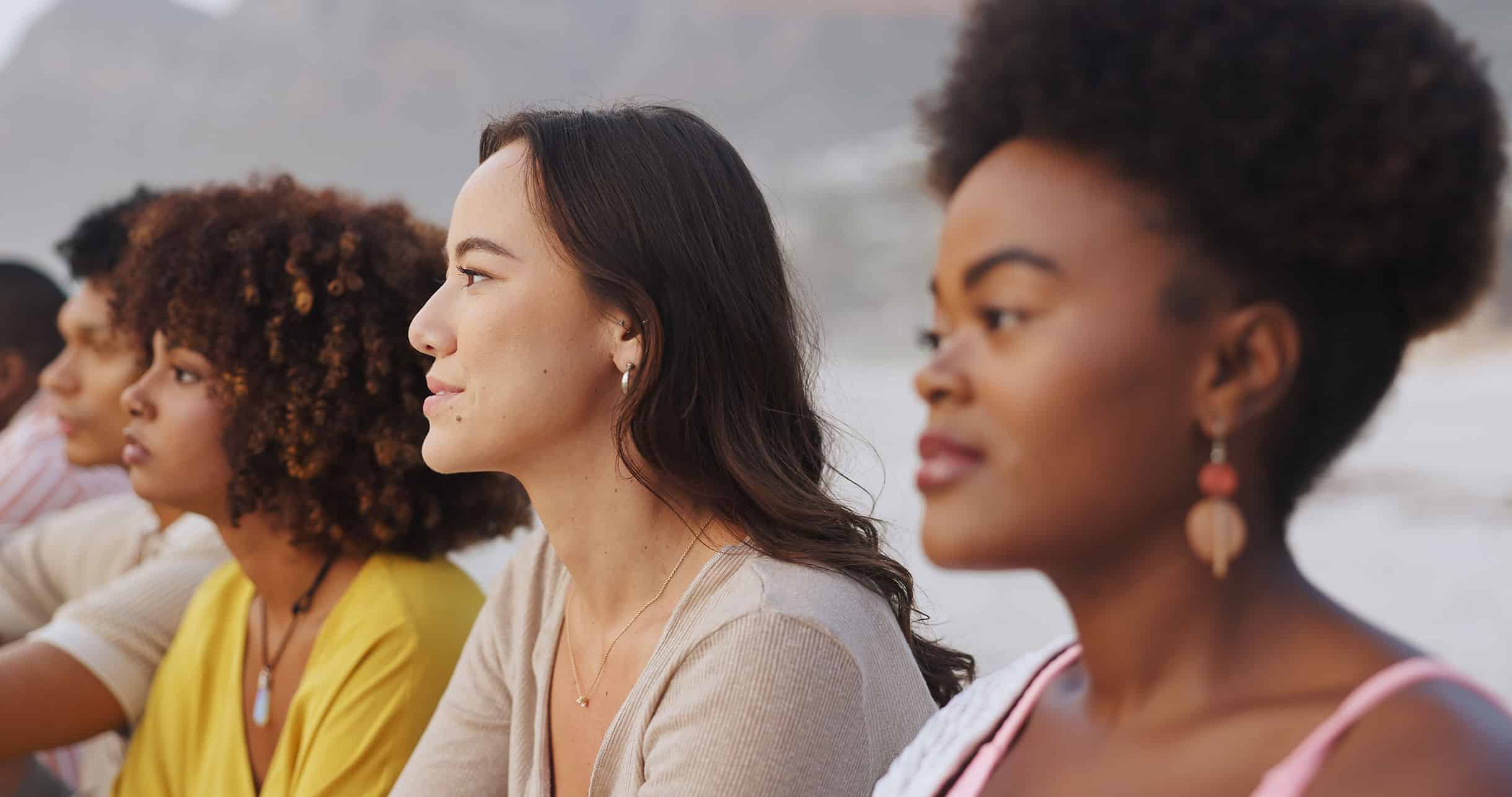 Group of women in side profile